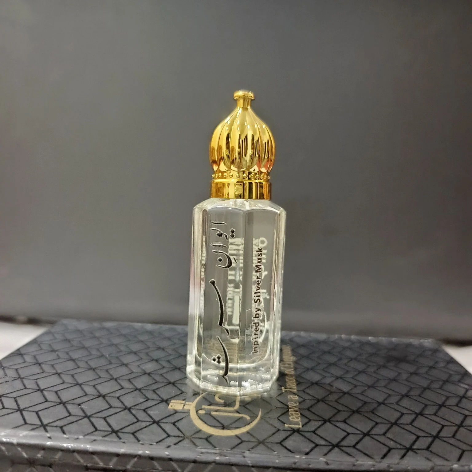 Aiwan-e-Murshid clear musk attar bottle